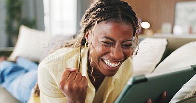 Buy stock photo Fist pump, winner and tablet with black woman on sofa in home for online casino prize, success and bonus. Connection, jackpot profit and app with person in living room of house for achievement