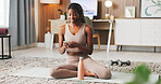 Happy, fitness and phone with black woman in home for communication, health app and break. Social media, yoga pose search and connection with person and mobile in living room of house for wellness