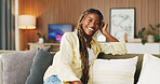 Happy, relax and portrait of black woman on sofa with good mood, smile and positivity on break. Apartment, couch and person with confidence, pride and calm on weekend for me time, rest and peace