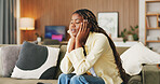 Black woman, headache and stress in home on sofa, exhausted and frustrated with brain fog in living room. Person, fatigue and migraine with chronic pain, burnout and tired with vertigo at house
