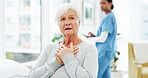Consultation, healthcare and senior woman with chest pain or cardiovascular emergency in hospital. Diagnosis, lung infection and elderly patient in clinic for discomfort, heart attack or illness.