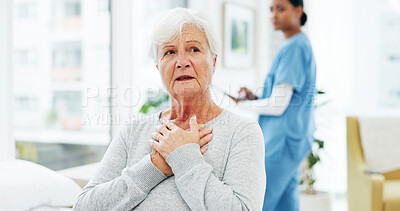 Buy stock photo Consultation, healthcare and senior woman with chest pain or cardiovascular emergency in hospital. Diagnosis, lung infection and elderly patient in clinic for discomfort, heart attack or illness.