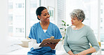Hospital, woman and senior nurse with clipboard for questions, assessment or exam on bed. Paperwork, health insurance and person with caregiver in consultation for medical advice, test and support
