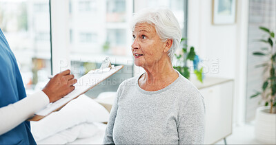 Buy stock photo Clinic, woman and nurse with clipboard for health insurance, assessment or exam on bed. Paperwork, questions and senior person with caregiver in consultation for medical advice, test and support