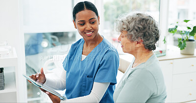 Buy stock photo Hospital, senior woman and nurse with tablet for questions, assessment or exam on bed. Digital tech, health insurance and person with caregiver in consultation for medical advice, test and support