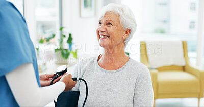 Buy stock photo Nurse, senior woman and blood pressure test in hospital for hypertension, healthcare checkup and exam. Assessment, people and monitor heart health with elderly patient for cardiovascular wellness