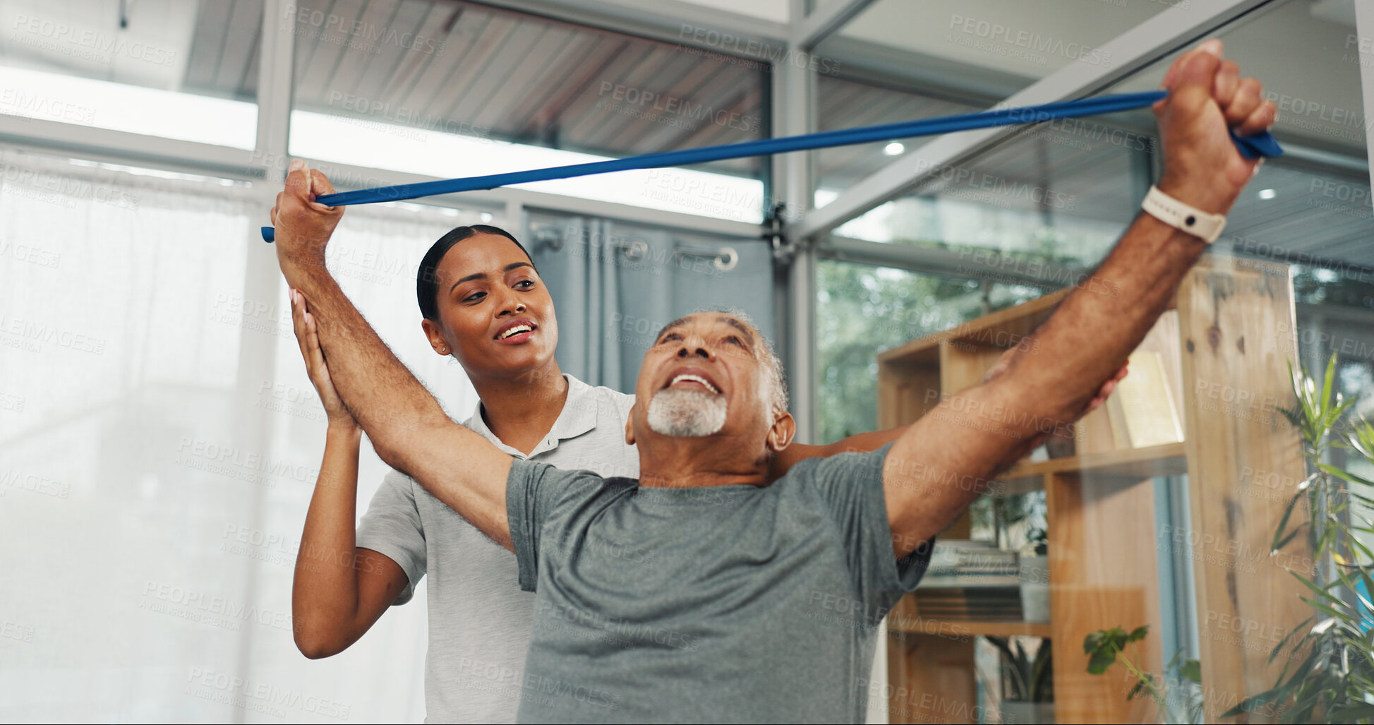 Buy stock photo Clinic, physio or old man stretching with resistance band for rehabilitation, muscle recovery or support. Health, professional or senior patient with exercise for functional mobility, healing or help