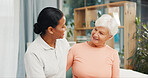 Physiotherapist, elderly woman and hug in clinic for rehabilitation, healing progress and talking. Healthcare, professional and senior patient with gratitude for recovery, physical therapy or support