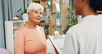 Old woman, physiotherapy and documents with clipboard, smile or nutrition facts for healing at clinic. People, patient and healthcare professional with report, feedback and happy for consultation