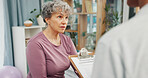 Consulting, clipboard and physiotherapy with old woman in office for healthcare, rehabilitation and orthopedic. Physical therapy, chiropractic recovery and checkup with person in clinic for support