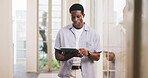 Review, journalism or black man in office with tablet, draft edit or source feedback for article update. Serious, creative or copywriter with tech, proofreading or industry research for publication.