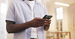 Man, hands and social media in office with phone, typing text message and alert for business email. Person, scroll and check notification in workplace with tech, mobile app or browse for online chat.
