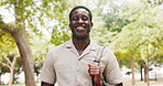 Business, portrait or black man in town with commute, ambition or morning travel in work routine. Happy, journey or employee in park with bag, pedestrian trip or career pride at start of day.