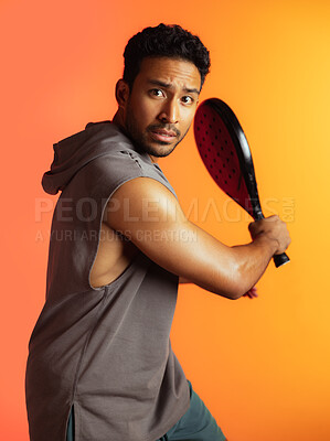 Buy stock photo Fitness, racket and padel with portrait of man for serve, sports athlete and swing practice. Competition tournament, tennis match challenge and training with person on studio background for exercise