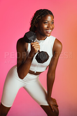 Buy stock photo Black woman, dumbbells and happy in studio for training, strong and wellness on pink background. African person, bodybuilder and thinking with weightlifting gear, exercise and smile for muscle growth