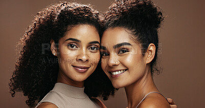 Buy stock photo Portrait, women and smile in studio with skincare, bonding together and makeup for beauty aesthetic. Happy, friends and confident with glowing skin, cosmetics and dermatology on brown background.