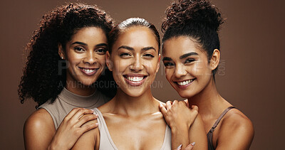 Buy stock photo Confident, portrait and women with makeup for glow, group and self care with cosmetics for wellness. Studio background, sisters and people with smile for skincare, embrace and dermatology in Brazil