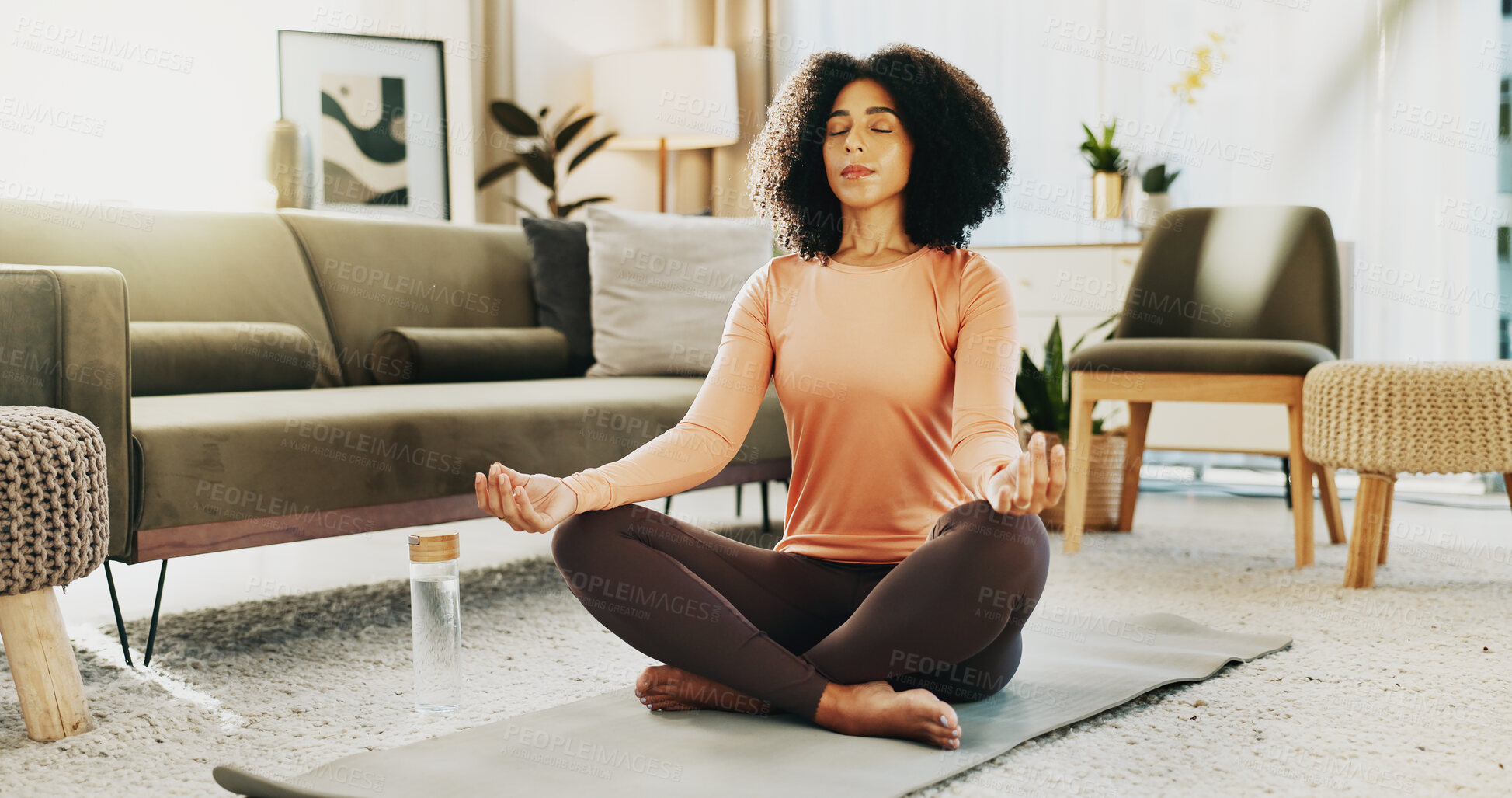 Buy stock photo Meditation, lotus pose and woman in home for breathing, balance or wellness in living room. Calm, health and female person with yoga exercise for relax, zen or self care for healing on mat in house.