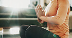 Prayer hands, meditation and woman in home for health, peace and wellness in morning for balance. Calm, namaste and female person with yoga pose for relax, zen or mindfulness in living room at house.