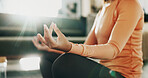 Meditation, hands and woman with lotus pose in home for calm, relax or mindfulness in morning. Peace, yoga and female person in living room with self care, health or wellness in healing at apartment.