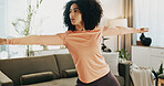 Yoga, fitness and woman in home for stretching, balance or exercise for wellness in morning. Health, challenge and female person in warrior pose for muscles with pilates in living room at apartment.