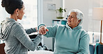Wrist pain, physiotherapist and senior woman with consultation, talking or support. Physical therapy, old person or chiropractor in office, healthcare or discussion to explain diagnosis or arthritis