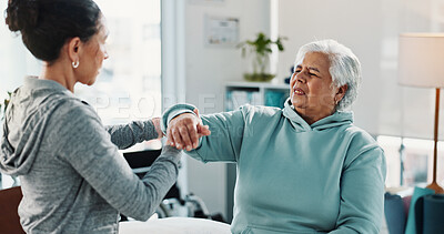 Buy stock photo Wrist pain, physiotherapist and senior woman with consultation, talking or support. Physical therapy, old person or chiropractor in office, healthcare or discussion to explain diagnosis or arthritis