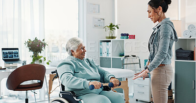 Buy stock photo Old woman, physiotherapist and wheelchair for dumbbells at hospital for exercise, support or recovery for injury. Person with disability, guide and smile for motivation, healing or rehabilitation