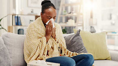 Buy stock photo Sick, blanket and black woman on sofa with tissue for viral infection, allergies and sinusitis in home. Apartment, health and person with napkin for blowing nose with cold, illness and flu season