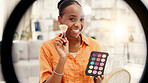 Happy woman, portrait and makeup tutorial with ring light, home and talking with audience on website. Content creation, online and black person with eyeshadow palette, social media and video in house