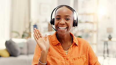 Buy stock photo Portrait, video call and black woman in home, headset for communication and happiness. Apartment, greeting or African person in living room, smile and wave for hello, conversation or virtual chatting