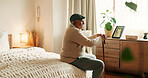 Thinking, sad or old man in bedroom with walking stick, loss or memory of past mistake. Mental health, reflection and elderly person in home with disability, nostalgia or regret in retirement.