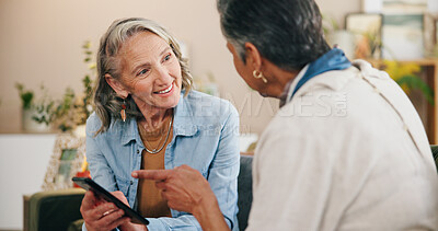 Buy stock photo Old woman, friends and share with phone on sofa for chat, meme or show funny video in retirement. Senior people, happy and smartphone with mobile app, point and social media with gossip at apartment
