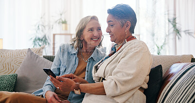 Buy stock photo Friends, smartphone and senior women in home, smile and digital app for social media. Happiness, apartment and mature people on sofa, relax or cellphone for website info, connection or online joke