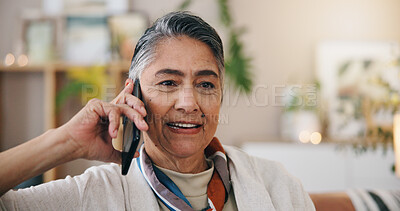 Buy stock photo Phone call, talking and senior woman in home, relax and digital app for communication. Happy, apartment and mature person on couch, smartphone for online chatting and conversation in living room