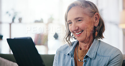 Buy stock photo Smile, tablet and senior woman in home, digital app for social media and laughing. Apartment, pensioner and elderly person in lounge, tech and online humor with joke, entertainment and retirement