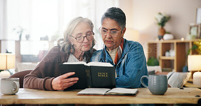 Buy stock photo Reading, bible and mature women in home with learning religion, praise or worship together. Holy book, bonding and female friends with studying for spiritual wellness in living room at apartment.