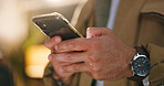 Cellphone, hands and businessman in office at night with texting, communication or networking. Technology, contact and male person with typing email on mobile app for project deadline in workplace.