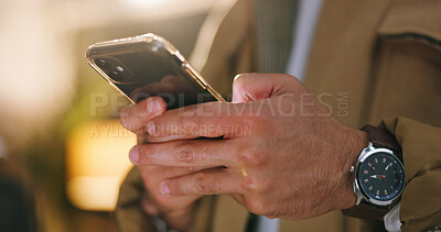 Buy stock photo Cellphone, hands and businessman in office at night with texting, communication or networking. Technology, contact and male person with typing email on mobile app for project deadline in workplace.