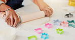Hands, mother and child baking with dough for learning, culinary skills and bonding together. Person, kid and helping with rolling pin, preparing pastry and teaching recipe for handmade snack in home