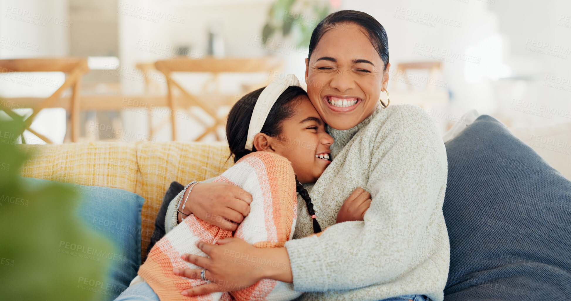 Buy stock photo Mother, child and hug on sofa with smile, connection and love for bonding together on weekend break. Happy, woman and daughter embrace in home with kindness, wellness and support for development.