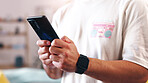 Man, hands and home with phone for social media, network connection or online app subscription. Male person, user or blogger with mobile smartphone for chatting, texting platform or vlog in house