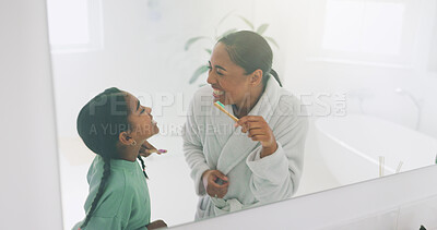 Buy stock photo Mirror, mother or girl in home with toothbrush, child growth or bonding together in dental care. Oral health, woman or kid with reflection, parent teaching or youth dentistry in childhood development