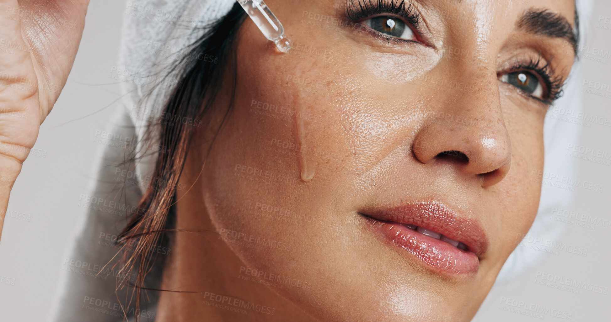 Buy stock photo Skincare, thinking or woman with serum in studio, apply hyaluronic acid or anti aging facial treatment. Dropper, dermatology or mature person with product for glowing skin, vision or white background