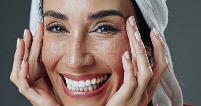 Buy stock photo Happy woman, portrait and studio with moisturizer for skincare or dermatology on a gray background. Female person, model or smile with smooth skin, glow or shine for beauty cosmetics or hydration