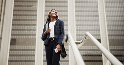 Buy stock photo Thinking, real estate and black woman in city, low angle or vision for investment opportunity. Happy employee, decision or African person in street, choice for urban location or property evaluation