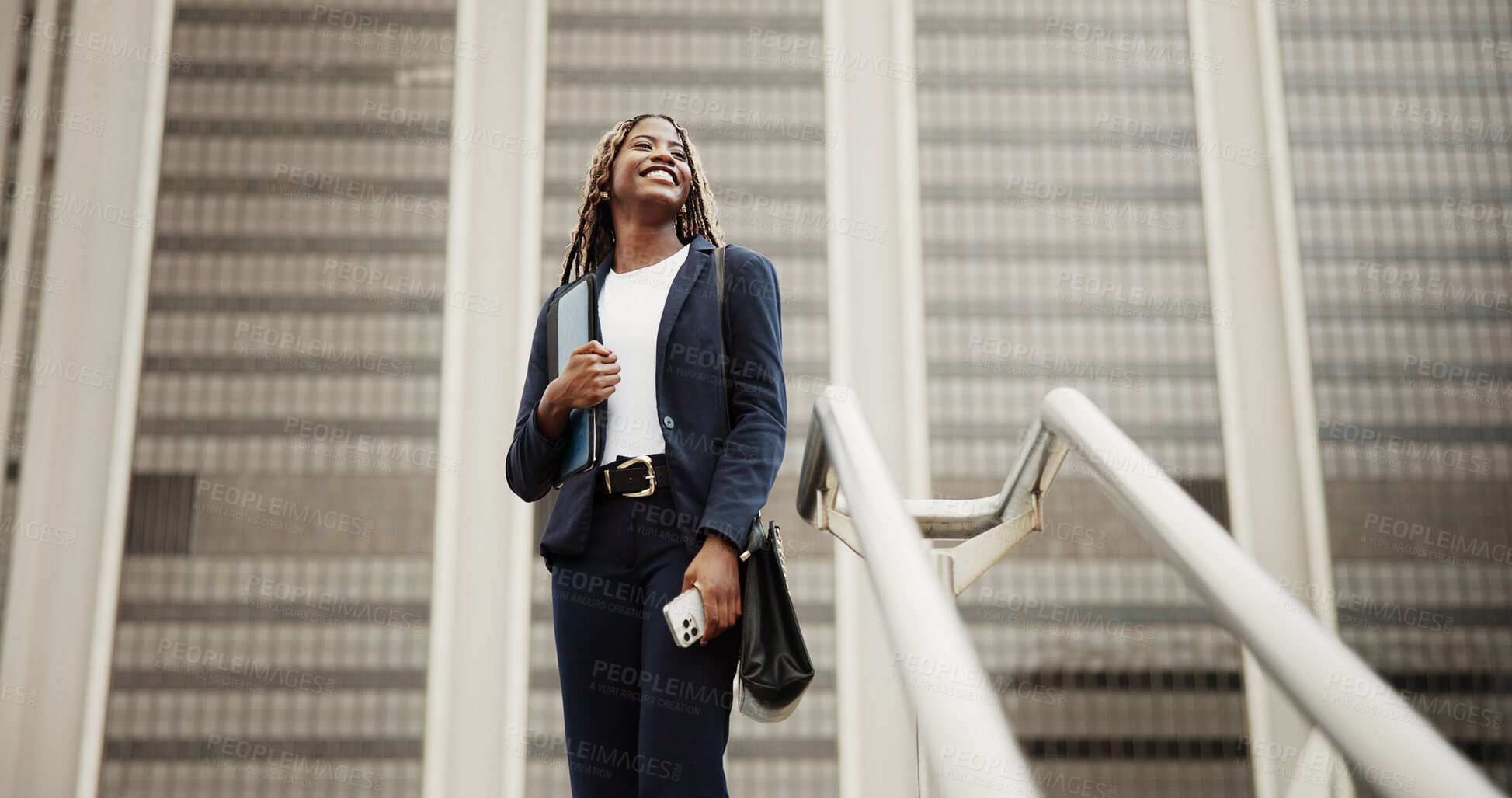 Buy stock photo Thinking, real estate and black woman in city, low angle or vision for investment opportunity. Happy employee, decision or African person in street, choice for urban location or property evaluation