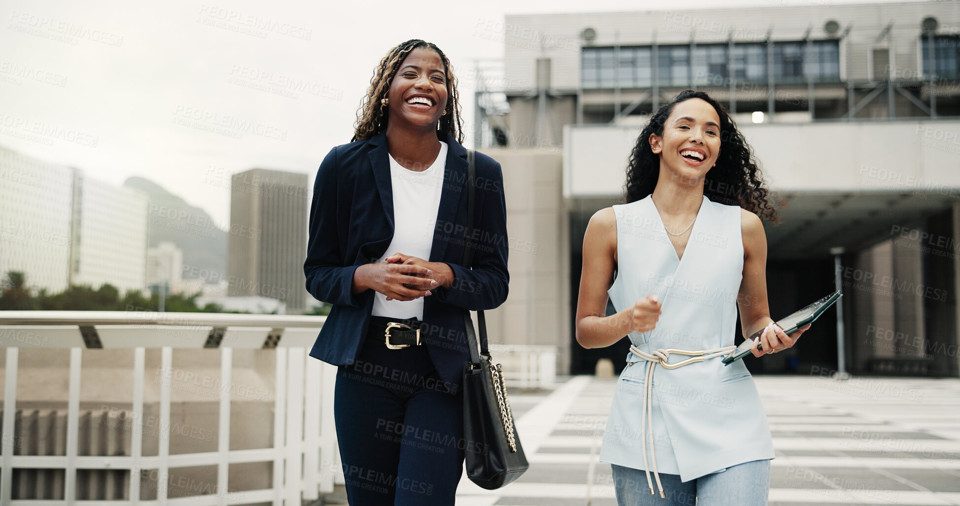 Buy stock photo Businesswomen, smile and friends in city on walk, commute and excited for property management career. People, team and real estate agent with partner, laugh and funny story with trip in urban town
