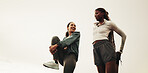 Women, friends and stretching for workout, warm up and routine for outdoor training with smile. Low angle, chat and people with leg exercise for fitness, endurance or marathon practice together