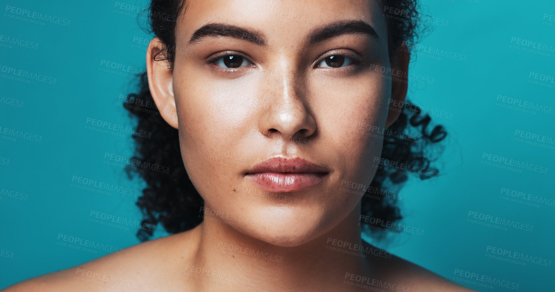 Buy stock photo Studio, portrait and skincare for woman for glow, serious and beauty with cosmetics for healthy skin. Blue background, face and person with pride for wellness, dermatology and self care in Brazil